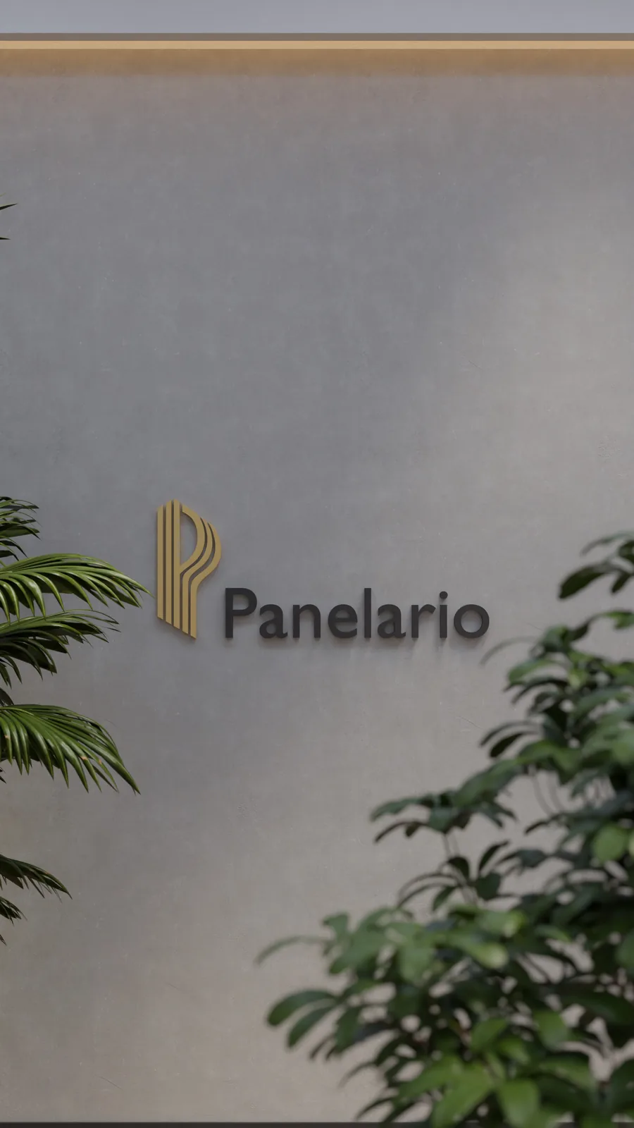 Panelario logo relief on a concrete wall